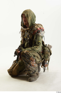 Photos John Hopkins Army Postapocalyptic Suit Poses kneeling whole body…